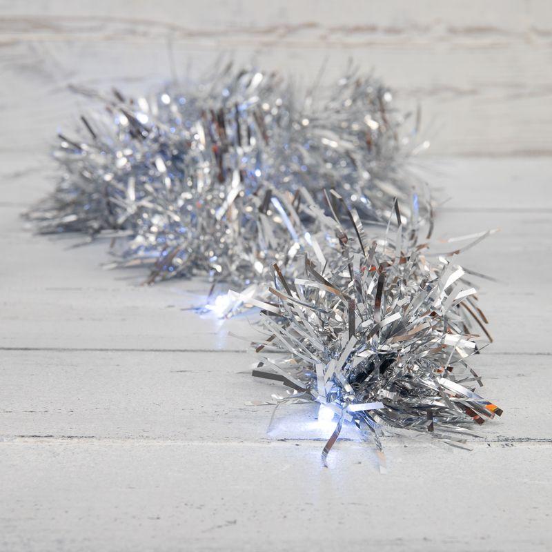 Гирлянда светодиодная "Мишура серебряная " 1.5м 10LED бел. 0.1Вт IP20 провод ПВХ прозр. элементы питания 2хAA (не в к...