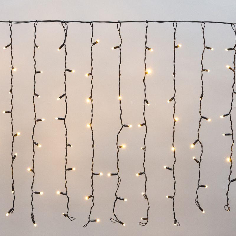 Гирлянда светодиодная "Дождь" 2х0.8м 160LED тепл. бел. 10Вт 230В IP65 провод черн. (нужен шнур питания 303-500) Neon-...