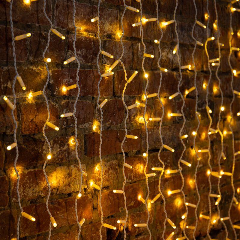 Гирлянда светодиодная "Дождь" 2х3м 600LED тепл. бел. 80Вт 230В IP65 эффект мерцания провод бел. (нужен шнур питания 3...